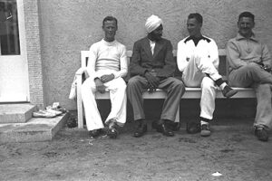 Berlin 1936: A member of the Indian delegation amongst other participants