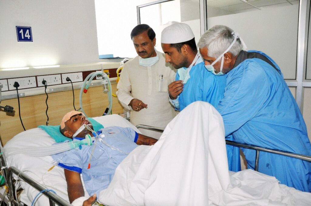 Mahesh Sharma meeting Danish in a hospital in Noida (Picture courtesy: PTI)